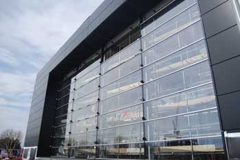 The glazed façade of the visitor centre