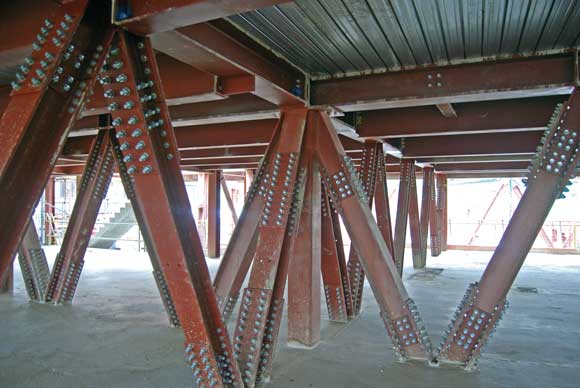 Trusses support the rooftop apartments