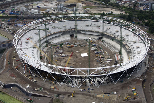 Roof starts to rise on Olympic Stadium