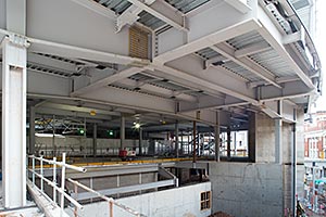 Plate girders form the large opening for the store’s main entrance