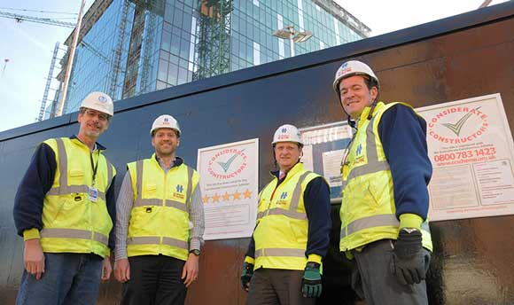 L-R: Peter Carlson, Bureau of Overseas Buildings Operations, US Government; Matt Goldsworthy, Project Manager, BL Harbert International; Bob Kay, Project Manager, Sir Robert McAlpine; and Pat Kelly, Works Manager, Sir Robert McAlpine.