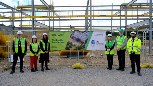 Steel signing ceremony marks milestone for Coalville school